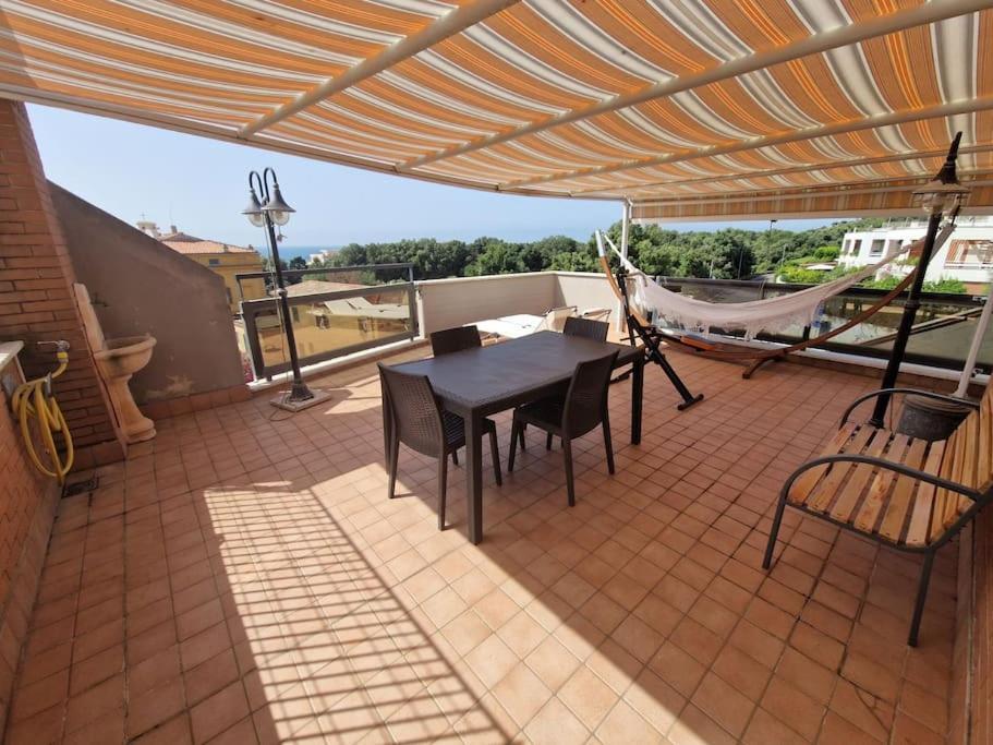 Terrazza A Nettuno E Chiesa Giubilare Santa Maria Goretti Exterior foto